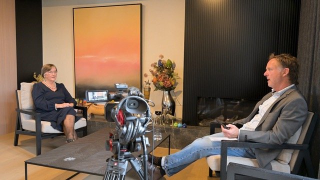 Paul Daffey filming a life-story interview, two cameras rolling
